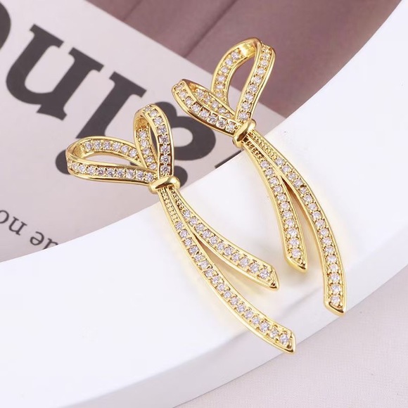 Kate Spade Skinny Bowknot Gold Studs Earrings - Picture 3 of 11